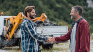 happy_customer_receiving_cash_from_car_wrecker